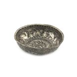 A Russian silver bowl, Tbilisi 1869, circular form, in the Ottoman manner, embossed with animals