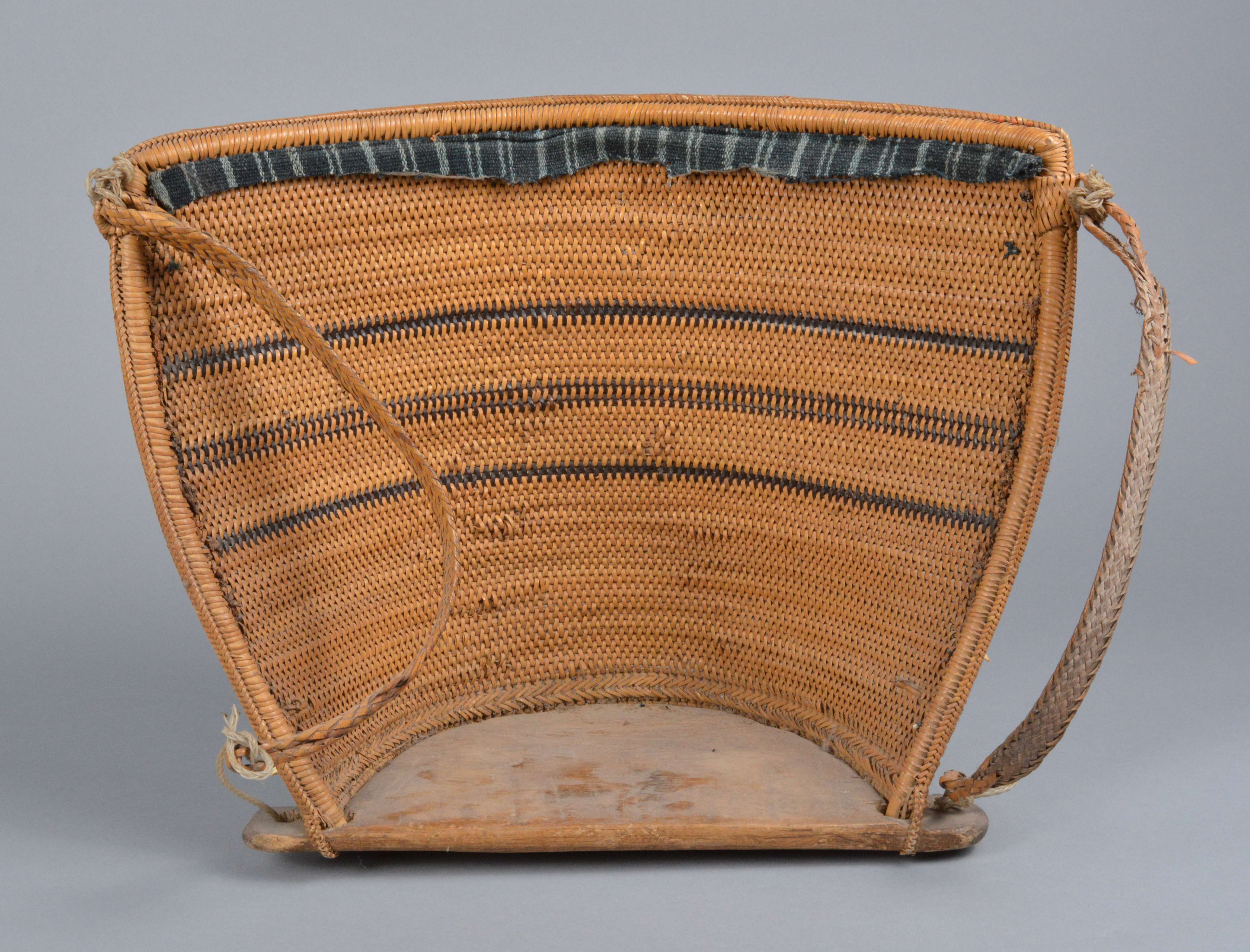 A Dayak baby carrier Borneo, Indonesia the basketry back hung with strings of glass beads, teeth, - Image 2 of 2