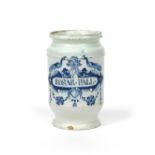 A Delft dry drug jar mid 18th century, the cylindrical form painted in blue with peacocks flanking a