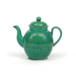 A green-glazed creamware teapot and cover dated 1794, the ovoid body lightly impressed with