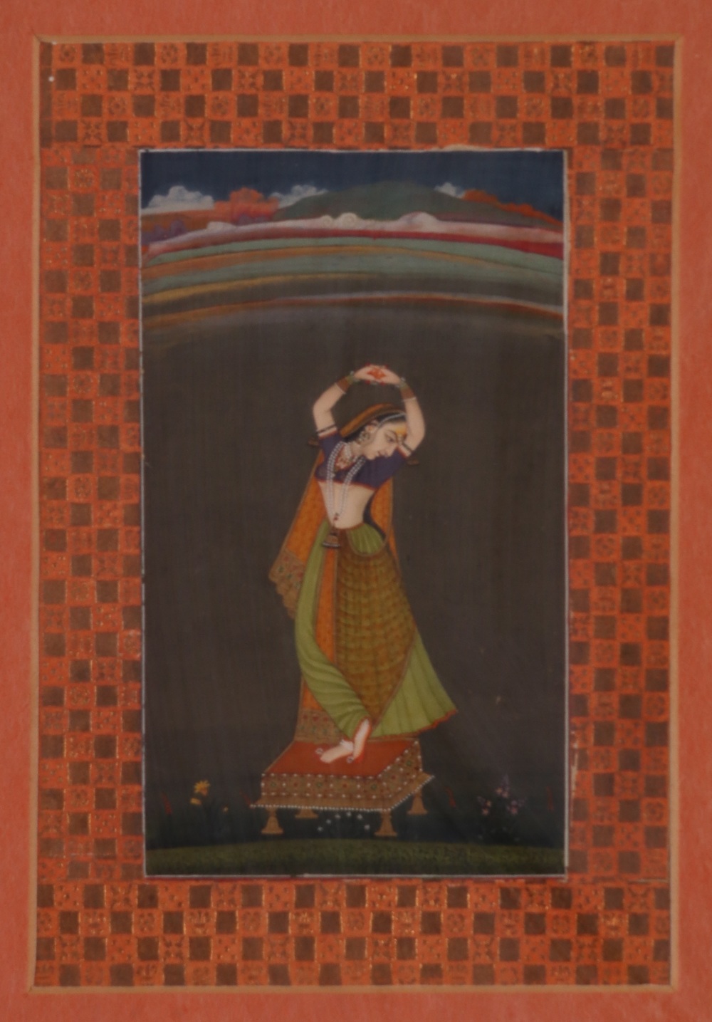 Rajasthan School, Probably c.1800A lady with her arms in Karkata Hasta (amorous longing) with an - Image 2 of 2