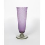 A Stevens and Williams Royal Brierley footed glass vase designed by Keith Murray, tall flaring