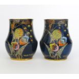 'Devil's Copse' a pair of Carlton Ware vases, pattern no.3787, printed and enamelled in colours