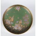 A Fielding's Crown Devon charger, pattern no.2130, printed and painted in colours and gilt, with two