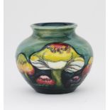'Claremont' a Moorcroft Pottery vase designed by William Moorcroft, ovoid form, tubeline decorated