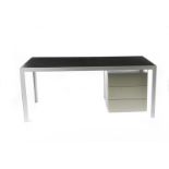 A Giorgio Armani coated steel desk, with hanging two drawer unit, the top with inset black