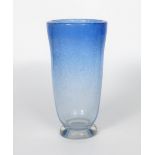 A Stevens and Williams Royal Brierley footed glass vase designed by Keith Murray, the flaring bucket