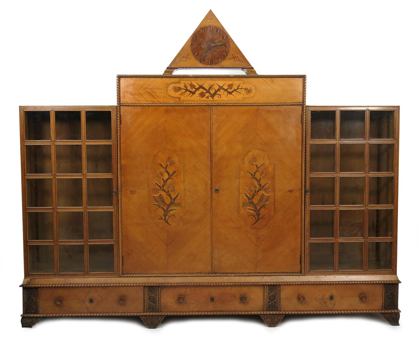 A large Austrian marquetry cabinet, two central doors inlaid with marquetry panels of a stylised