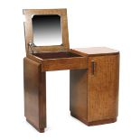 A satin wood dressing table in the manner of Betty Joel, rounded rectangular form with hinged curved