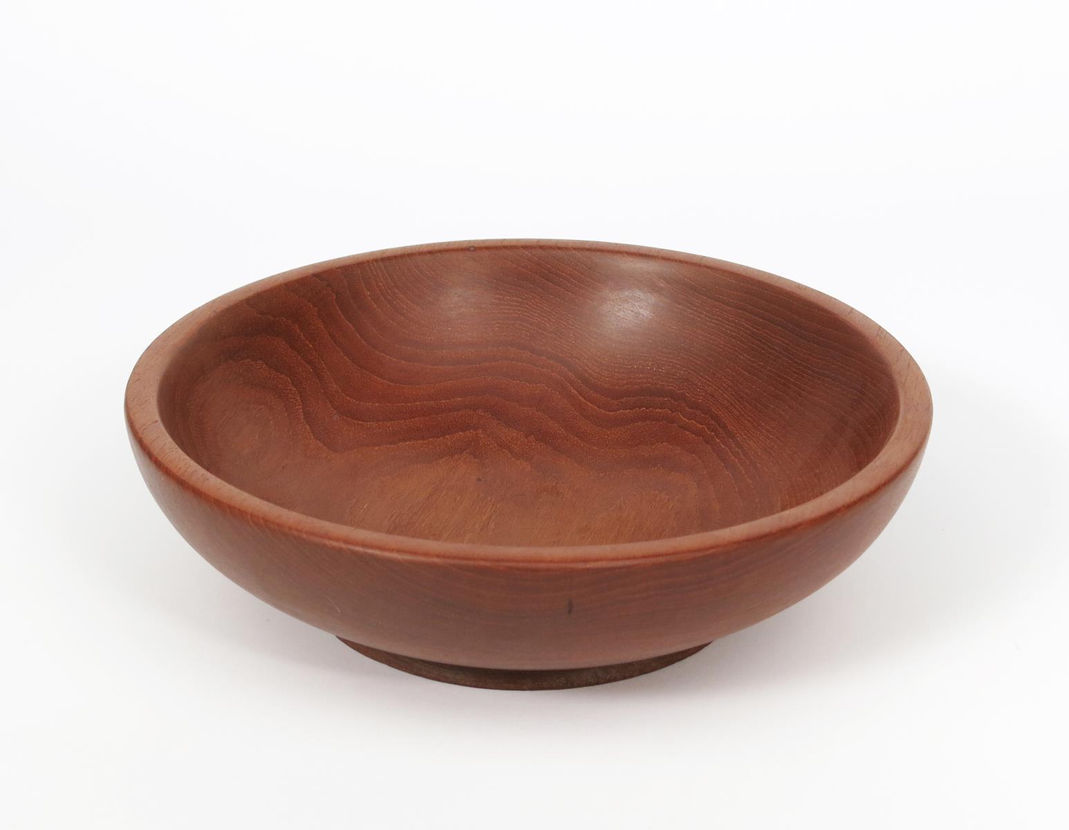 ‡ An Alan Peters Furniture mahogany bowl designed by Alan Peters OBE, circular section on shallow