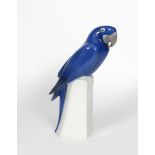 A Royal Copenhagen model of a parrot the design attributed to Armand Petersen, model no. 2235, the