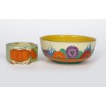 'Gay Day' a Clarice Cliff Bizarre bowl, painted in colours, and an Orange Lily hexagonal bowl,