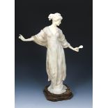 Paul Phillipe (1870-1930) Girl and Mirror, Vanity a tall alabaster and ivory figure, modelled with