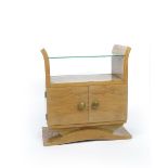 A small bedside cabinet possibly Bowman Brothers, rectangular section, the two drawer cupboard on