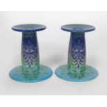 'Wisteria' a pair of Dennis China Works candlesticks designed by Sally Tuffin, dated 2006, painted