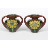 A pair of Art Nouveau Brantjes & Co Purmerende twin-handled vases, model no.1026, shouldered form,