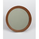 A Danish teak wall mirror, circular frame stamped Made in Denmark 49.5cm. diam. Provenance The