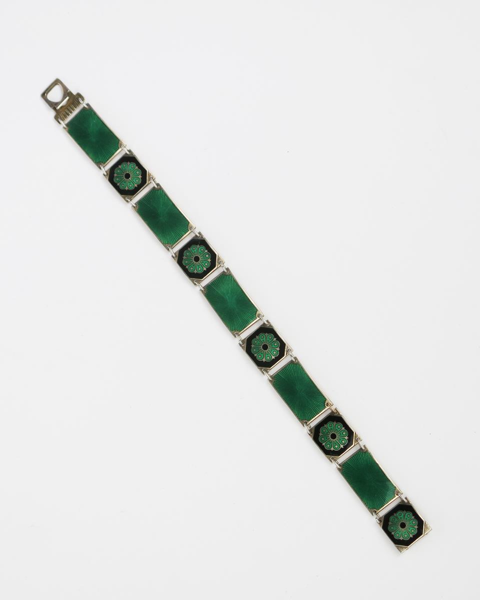 A David Anderson silver and enamel link bracelet, rectangular links enamelled with stylised flower