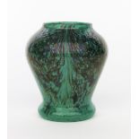A Moncrieff's Monart Ware Stoneware vase, shape, clear liner, mottled green glass with blue pulls