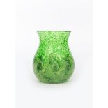 A Moncrieff's Monart Ware glass vase, shape VI, waisted form, clear glass with vivid green spot