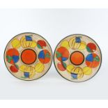 'Melon' a pair of Clarice Cliff Fantasque Bizarre plates, painted with a radial border in colours