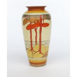 'Coral Firs' a Clarice Cliff Bizarre 120 vase, painted in colours between yellow and brown bands,