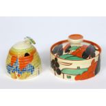 'Windbells' a Clarice Cliff Bizarre beehive honey pot and cover, painted in colours, and a Clarice