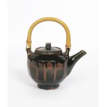 Jim Malone (born 1946) an Ainstable Pottery stoneware teapot and cover, with bamboo handle, cut-
