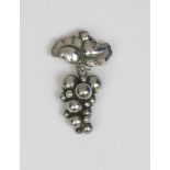 A Georg Jensen silver Moonlight Grape brooch designed by Harald Nielsen, model no.217, cast with two