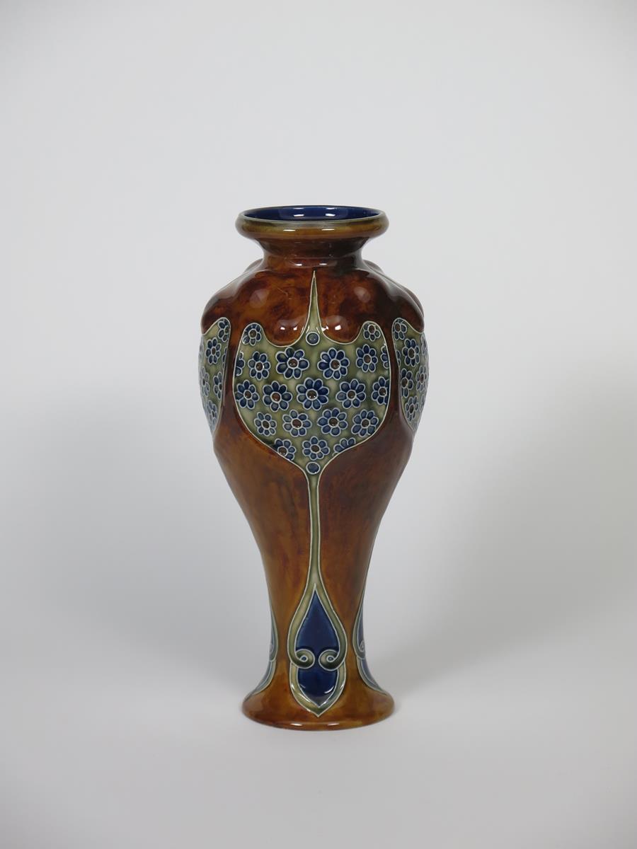 A tall Art Nouveau Royal Doulton vase by Frank Butler and Bessie Newberry, swollen, slender baluster