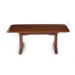 A Betty Joel Token Works walnut dining table, made by W R Hamilton, 1929, the canted rectangular top