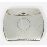 A Cohen & Charles silver cigarette case, hinged, rounded rectangular form, the clasp set with blue