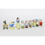 'Snow White and the Seven Dwarfs' seven Walt Disney pottery tooth brush holder figures, comprising