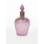 A Moncrieff's Monart Ware scent bottle and stopper, shape VB, mottled pink cased in clear with