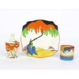 'Woodland' a Clarice Cliff plate, printed and painted in colours, a Clarice Cliff Rhodanthe preserve