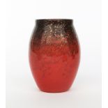 A Moncrieff's Monart Ware glass, shouldered form with collar rim, clear glass, mottled red