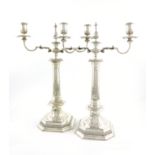 A pair of Victorian silver two-light candelabrum, by George Lambert, London 1893, in the Queen