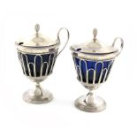 A pair of early 19th century French silver mustard pots, Paris 1803-9, tapering circular form,