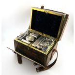 λA Victorian silver gentleman's travelling dressing table set, by Frances Douglas, London 1854/55,