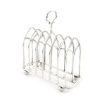 A Victorian silver seven-bar toast rack, by Roberts & Slater, Sheffield 1858, Gothic arch form,