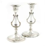 A pair of Edwardian silver candlesticks, by Hawksworth, Eyre and Company Limited, Sheffield 1902,