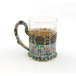 A Russian silver-gilt and enamel tea glass holder, by the 6th Artel, circa 1915, Moscow marks for