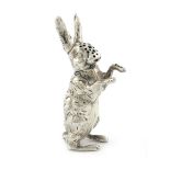 An Edwardian novelty silver hare pepper pot, by Grey and Co., Birmingham 1906, modelled in a