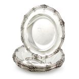 A set of six George IV regimental silver soup plates, by Robert Garrard, London 1829, retailed by