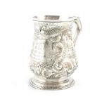 A George II silver mug, by Francis Crump, London 1757, baluster form, leaf capped scroll handle,