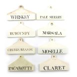 A collection of eight 19th century creamware and pearlware bin labels, including ones by Wedgwood