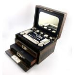 A Victorian silver travelling dressing table set, by Thomas Whitehouse, London 1882, retailed by