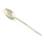 An 18th century silver mote spoon, maker's mark IT, probably colonial, circa 1770-80, the bowl