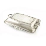 An Art Deco silver entrée dish and cover, by Mappin and Webb, Sheffield 1941, rectangular form,