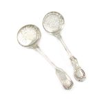 A Victorian silver Cambridge pattern sugar sifting spoon, by George Adams, London 1865, plus another